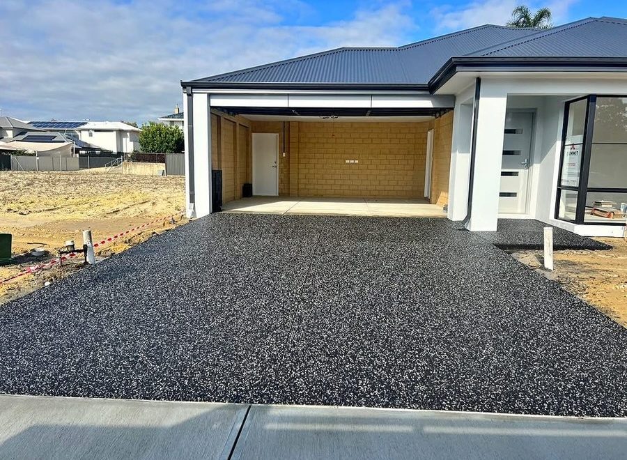 Exposed aggregate driveway at a brand new home