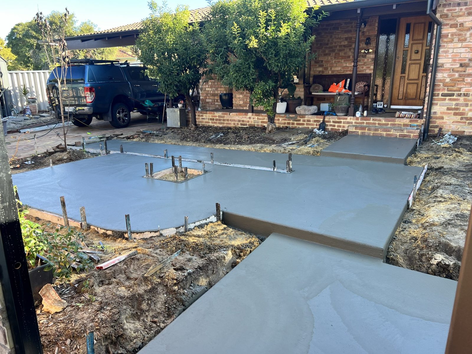 Freshly poured concrete slab with steps